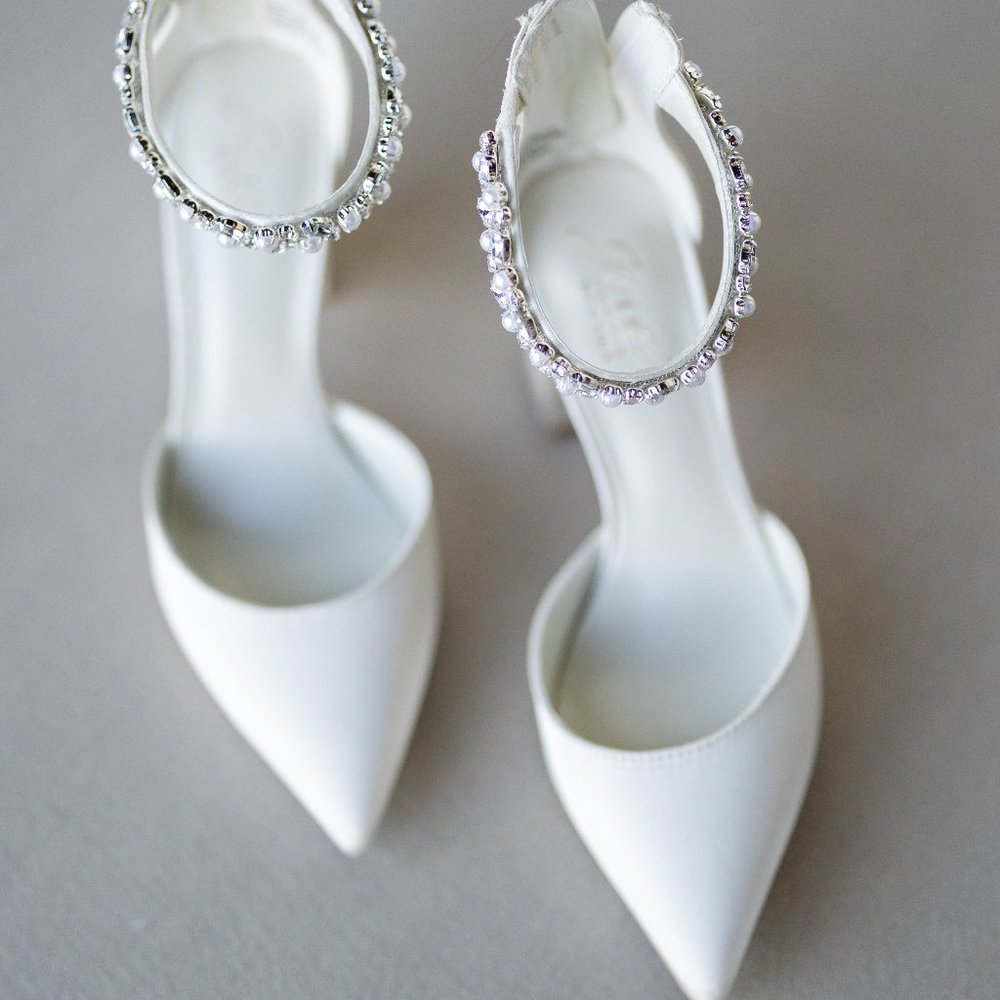 Ivory pointed toe satin block heels with crystal strap